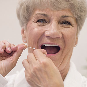 KeeptheSpacebetweenanImplant-SupportedBridgeandtheGumsClean