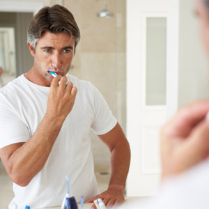 GoodOralHygieneJustasImportantforImplantsasforNaturalTeeth